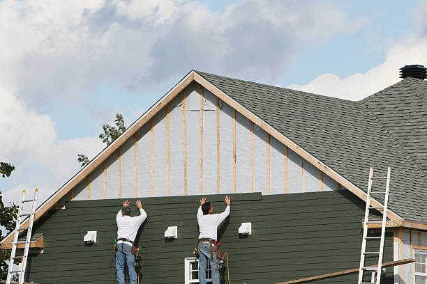 Professional Emergency Siding Repair technician working in Hutchinson, PA